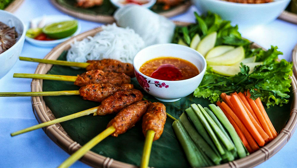 Enjoy Hue’s grilled pork skewers on a street food adventure